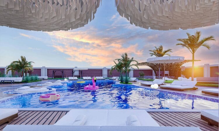 outdoor pool, sitting area, and sunbeds