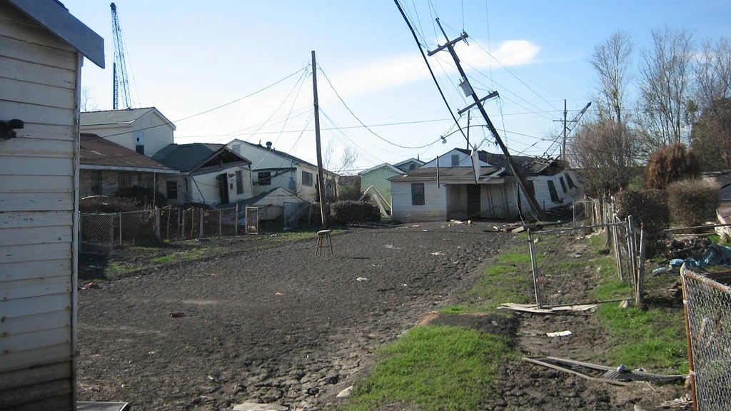 Illustrative flood damage affecting a residential street and nearby homes