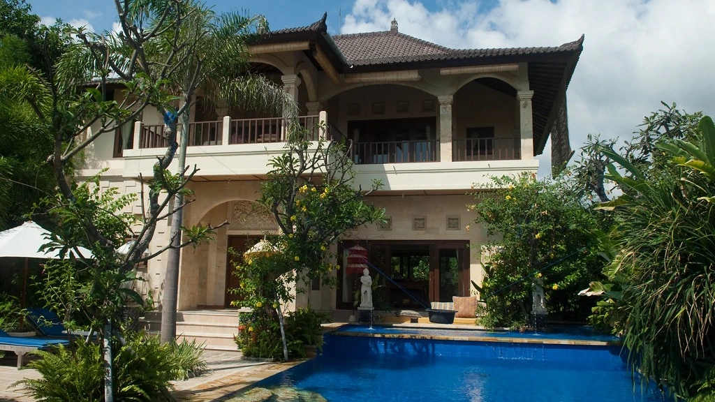Illustrative landscaped villa with a private swimming pool